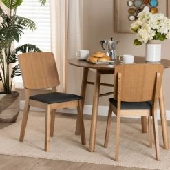 Brand new ๐ฏ Baxton Studio Denmark Mid-Century Modern Black Fabric And French Oak Brown Finished Rubberwood 2-Piece Dining Chair Set ๐